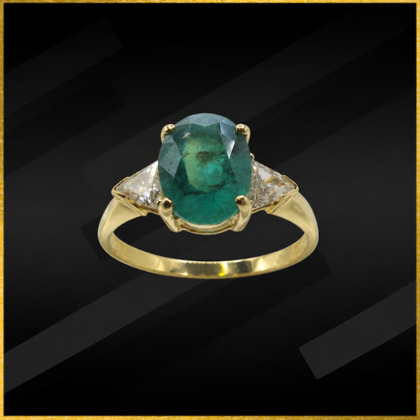 18 carat yellow gold emerald and diamond ring