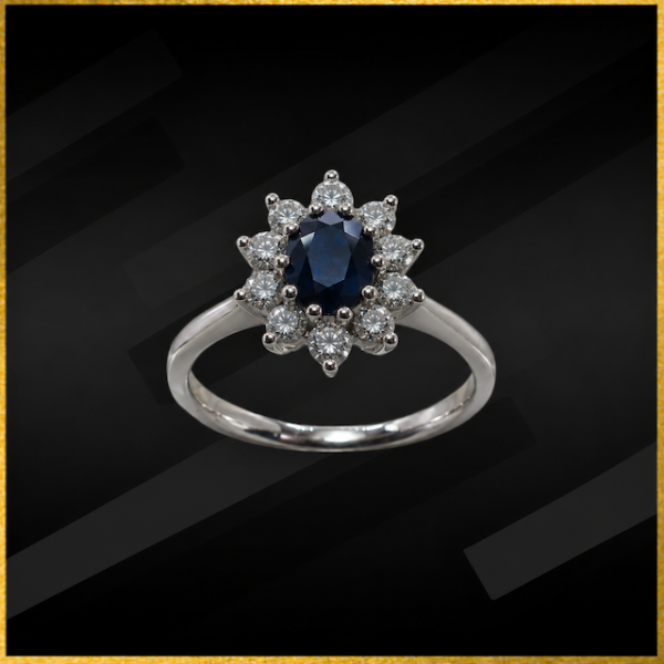 18 carat white gold sapphire and diamond cluster ring