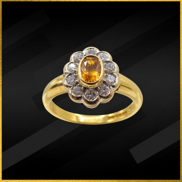 18 carat yellow gold diamond and yellow sapphire ring