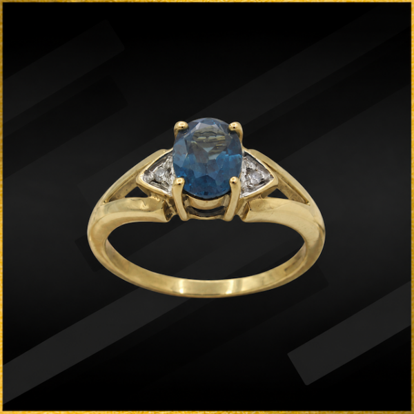 9 carat yellow gold blue topaz and diamond ring
