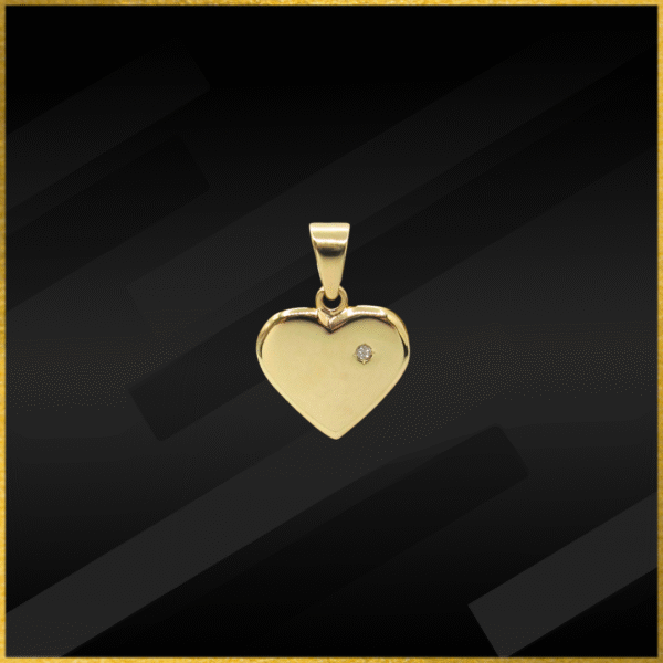 9 carat yellow gold diamond heart pendant.