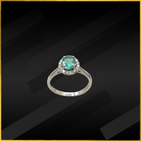 9 carat white gold emerald and diamond ring
