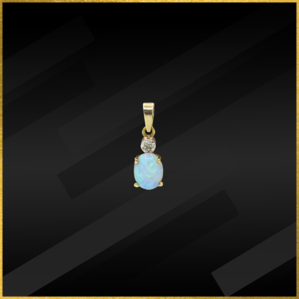 9 carat yellow gold opal and diamond pendant